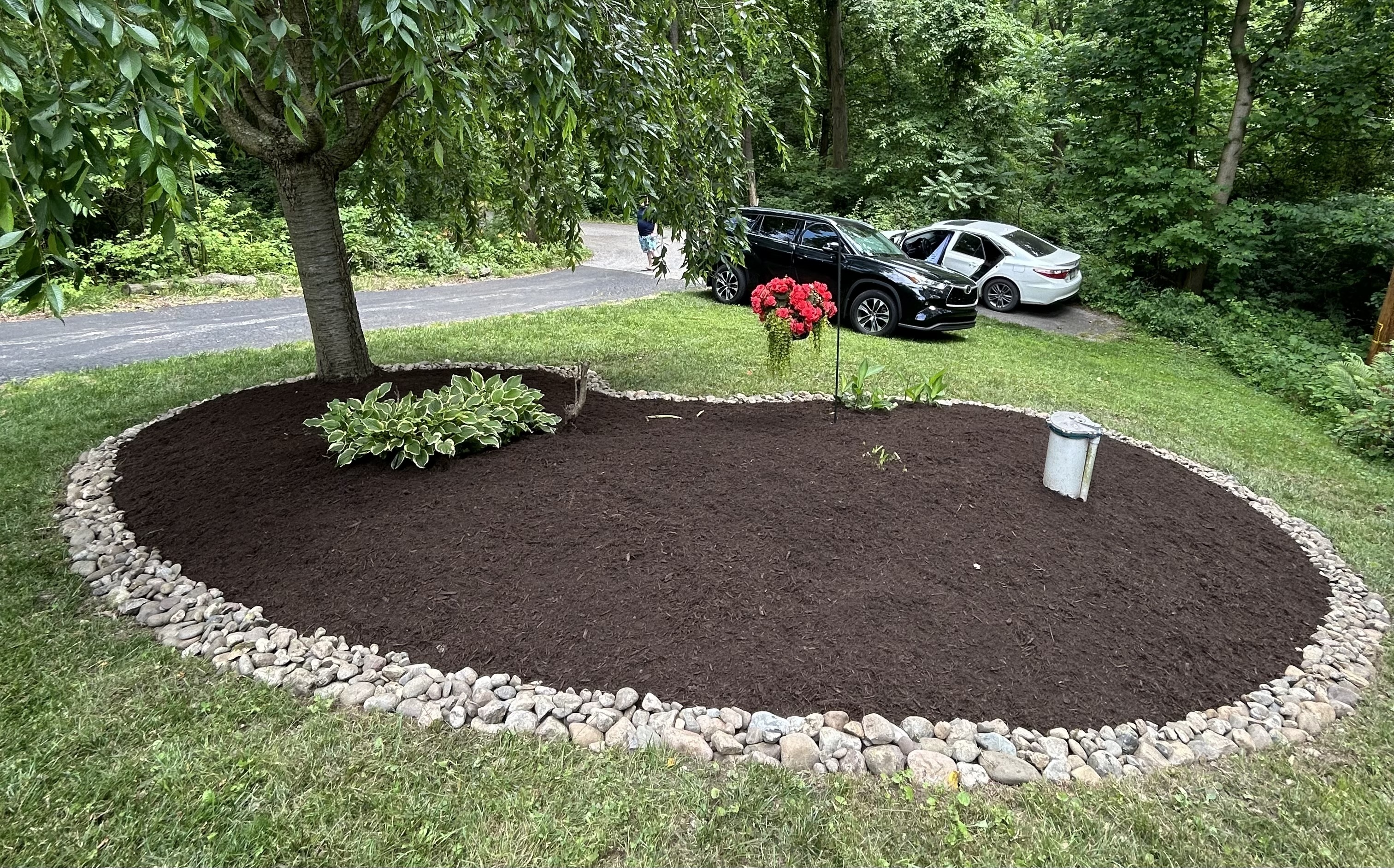 Mulching with rock border in Coatesville PA